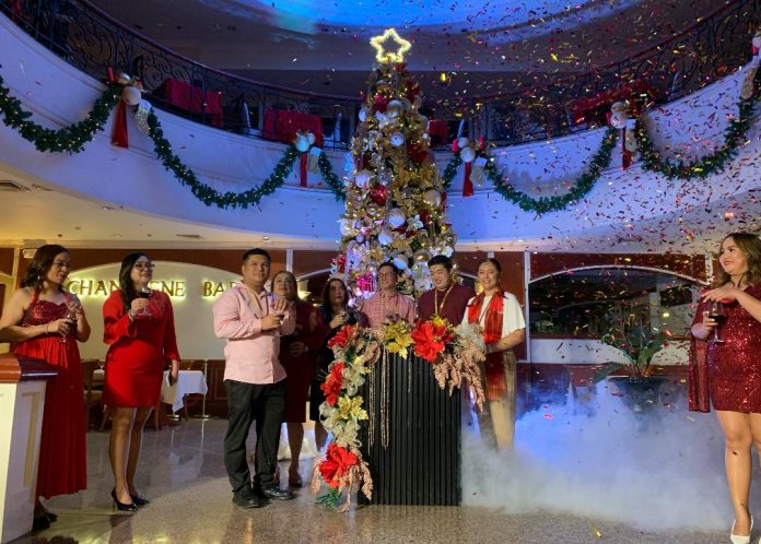 Grand Regal Hotel illuminates its giant Christmas tree and Christmas installations to welcome the yuletide season on Monday evening. LEAN DAVAL JR