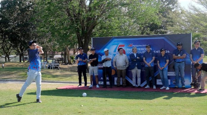 Howard Lance Uyking, Philippine Airlines assistant vice president for brand management, hits the ceremonial ball ushering in the PAL Seniors Interclub golf team championships in Cagayan de Oro City. Others in photo are (from left) PAL vice president for sales Salvador Britanico, Pueblo de Oro general manager Kits Penga, Del Monte golf chairman Robert Wapano, Cagayan de Oro councilor George Sio Goking, Limketkai Luxe Hotel GM Jerome dela Fuente, PAL Express president Rabi Ang, PAL tournament executive committee member May Flores, PAL VP for planning Christoph Gaertner, and PAL vice president for security Teddy Quinzon.