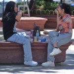 A female student shares a laugh with her fellow learner while they are enjoying their lunch at Rizal Park along San Pedro Street in Davao City. LEAN DAVAL JR
