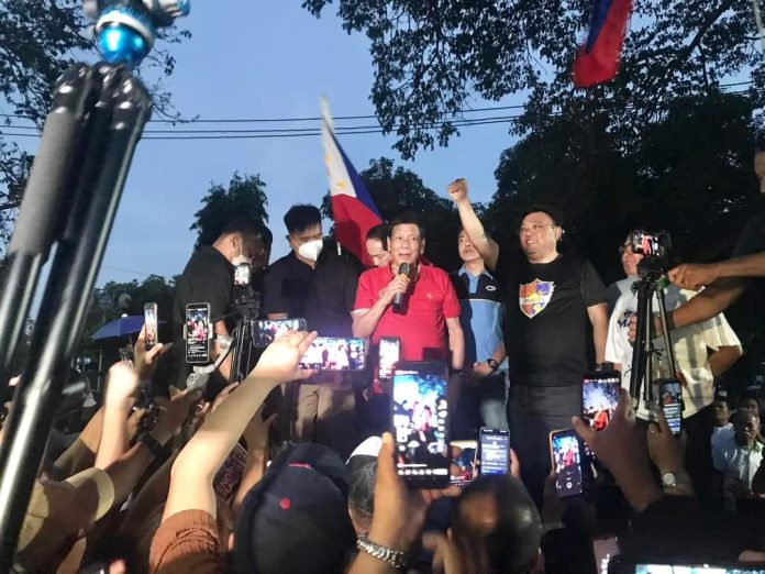 Former president Rodrigo Duterte holds a press conference onboard a truck with sound system plugged into a mobile generator at the sidelines of Hakbang ng Maisug prayer rally at the Freedom Park in Dumaguete City on Tuesday, May 7, 2024. Photo courtesy of Peter Laviña