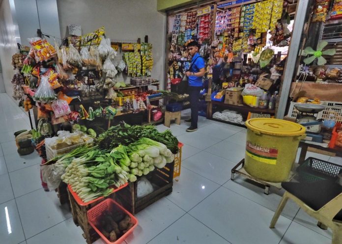 Fresh vegetables and other basic goods are on display at a market stall inside the Agdao Public Market in Davao City in this undated photo. The Philippine Statistics Authority said the country's headline inflation slightly increased from 3.8 percent in April to 3.9 percent in May. LEAN DAVAL JR