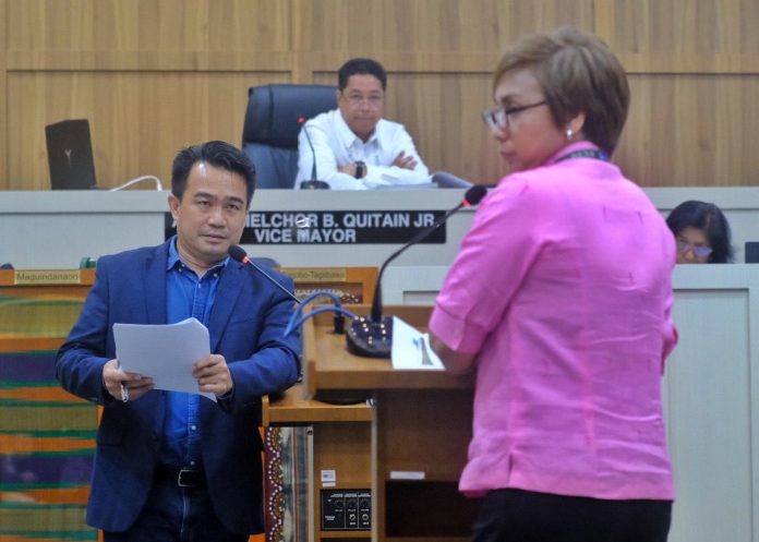 Councilor Bernard Al-ag asks clarificatory queries to Department of Environment and Natural Resources 11 (DENR 11) Regional Executive Director lawyer Ma. Mercedes V. Dumagan during Tuesday's regular session of the City Council. Dumagan confirmed that the trekking site in Barangay Tagurano is within the Mt. Apo Natural Park Strict Protected Zone (MANP SPZ). LEAN DAVAL JR