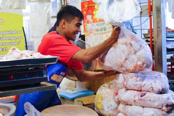 A vendor prepares chicken meat inside Agdao Market in Davao City on Wednesday (13 November 2024). According to the vendors, they are expecting a price hike on meat and other poultry products as Christmas approaches. MindaNews photo