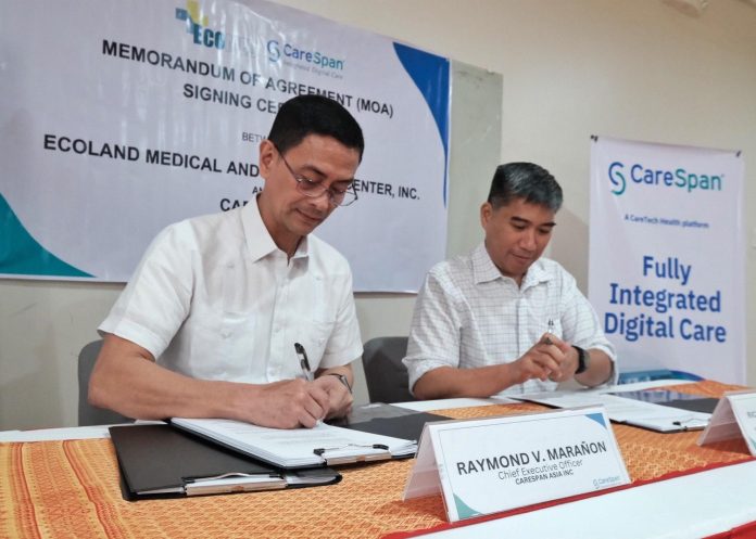 Carespan Asia, Inc. Chief Executive Officer Raymund Marañon (left) and Ecoland Medical and Wellness Center, Inc. President Ricardo Pascua Jr. sign a memorandum of agreement (MOA) to promote free primary healthcare for Dabawenyos held at EcoMed along Quimpo Blvd., Davao City on Monday. LEAN DAVAL JR