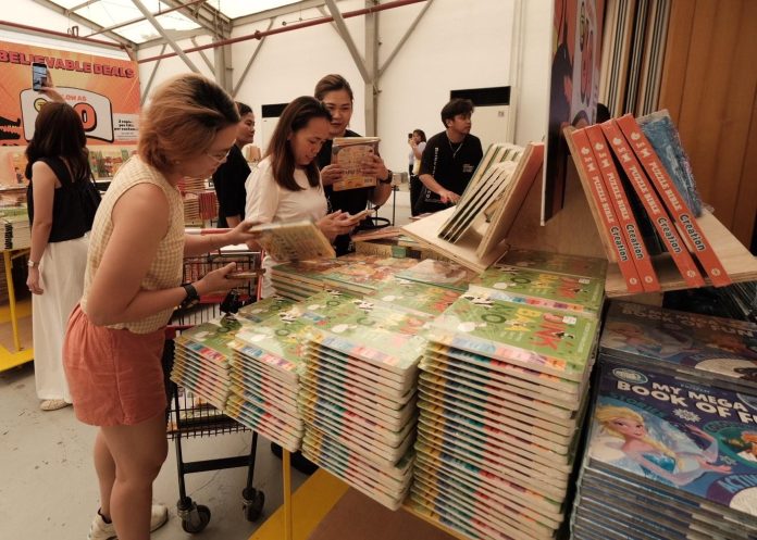 Dabawenyo book lovers choose from a wide collection of books during the VIP Day of the Big Bad Wolf Book Sale Davao 2024 at The Tent of Azuela Cove in Lanang, Davao City. LEAN DAVAL JR