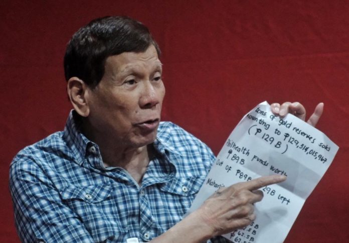 Former President Rodrigo Duterte accuses President Ferdinand Marcos Jr. and House Speaker Martin Romualdez during a presser in Davao City on Monday evening of squandering the people’s money causing the country to 