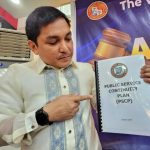 Councilor Diosdado Angelo Mahipus Jr, chair of the Committee on Disaster Risk Management and Ethics, shows the Davao City Public Service Continuity Plan (DCPSCP) that he proposed. The DCPSP was approved by the City Council last November 12. LEAN DAVAL JR