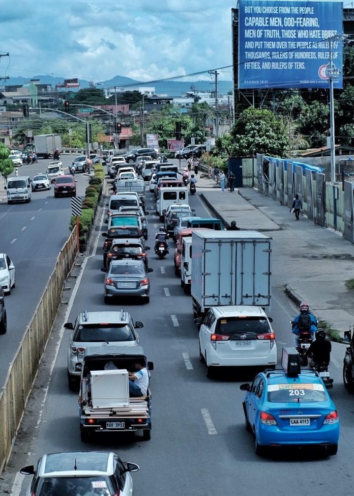 Vehicles maneuver through traffic along MacArthur Highway in Matina, Davao City, where three big schools are located, during morning rush hour on Thursday. Although Davao City experiences traffic congestion during peak hours, Dabawenyos believed the result of a latest commissioned survey wherein the city ranked 8th most congested city in the world is inaccurate. LEAN DAVAL JR