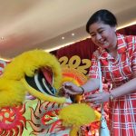 Acacia Hotel Davao Resident Manager Daffodil Bahani leads the traditional lion eye-dotting ceremony as the hotel ushers the Year of the Wood Snake with its Chinese Lunar New Year celebration on Wednesday. LEAN DAVAL JR